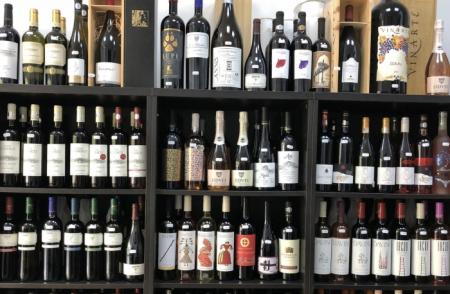Why is it recommended to buy wine from specialized wine stores?